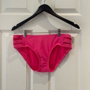 Woman’s hot pink bikini bottoms